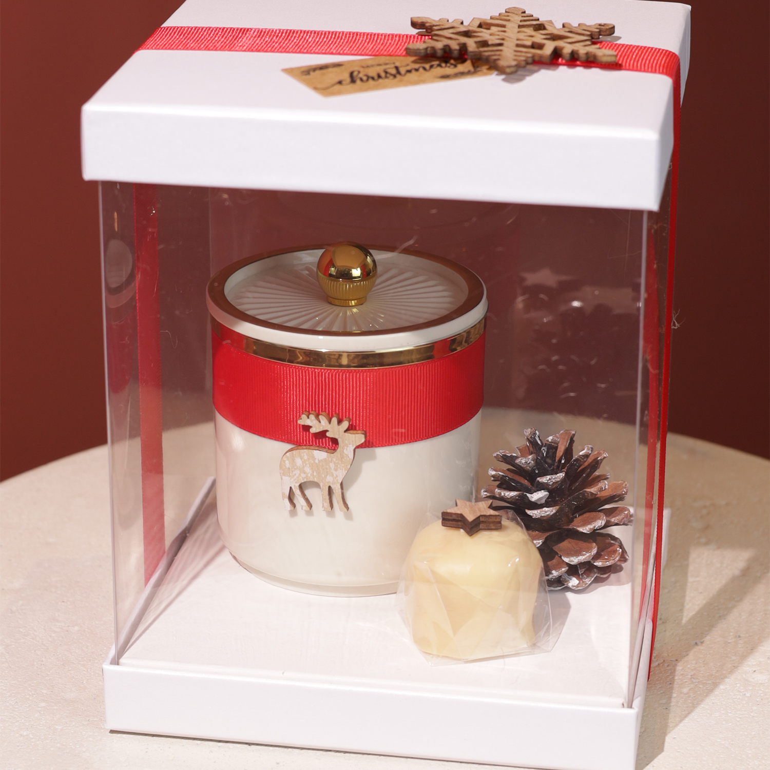 White box with beige jar