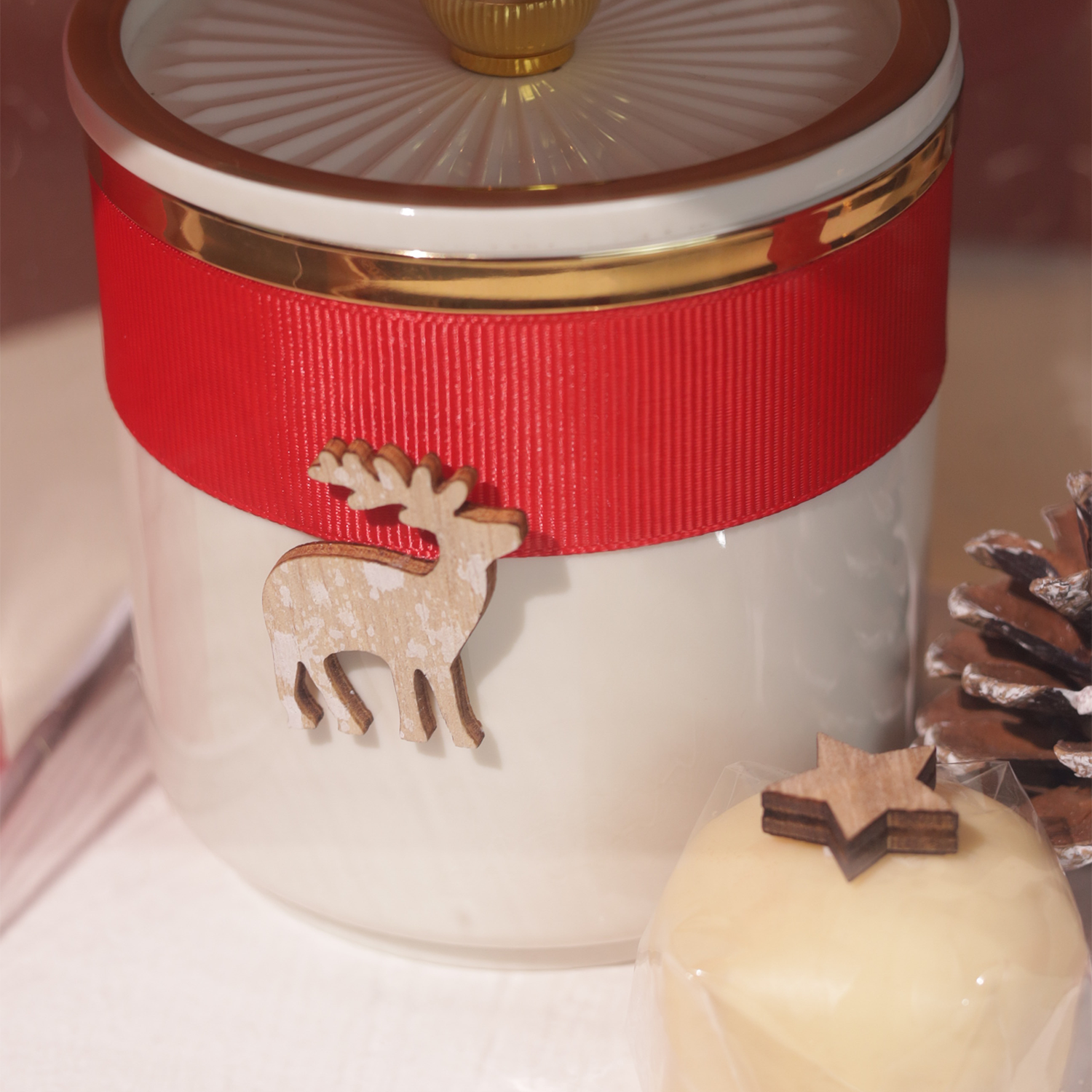 White box with beige jar